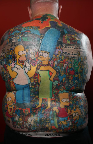Illustration for article titled An Australian dude has 203 Simpsons characters tattooed on his back